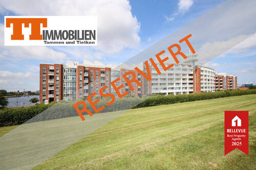 Bild1 - TT bietet an: 3-Zimmer-Eigentumswohnung mit Meer- und Hafenblick am Südstrand in Wilhelmshaven - Wohnen mit Weitblick!