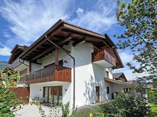 Südwestansicht Haus - Hochwertiges Reihenendhaus in zentraler Lage mit Garten und tollem Bergblick