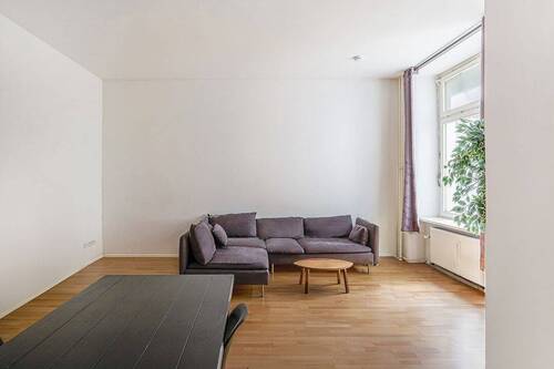 Wohn- und Essbereich - 1 Zimmer Etagenwohnung zum Kaufen in Berlin