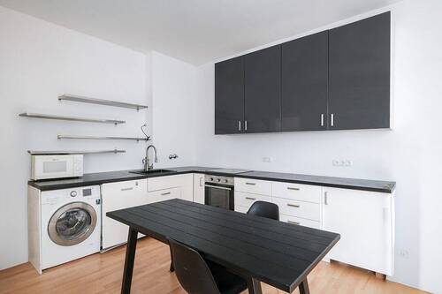 Einbauküche im Wohn- und Essbereich - 1 Zimmer Etagenwohnung in Berlin