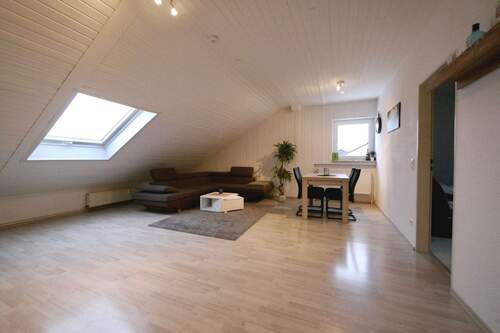 Wohnzimmer Ansicht 3 - Etagenwohnung mit 66,00 m&sup2; in Taunusstein zur Miete