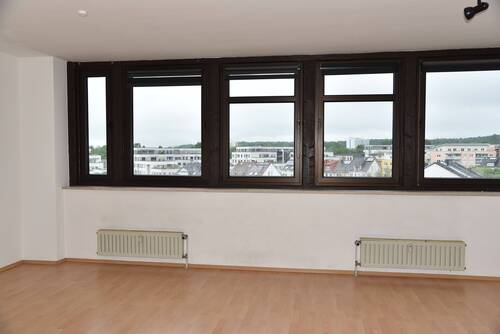 Wohnbereich - 1 Zimmer Etagenwohnung in Langen