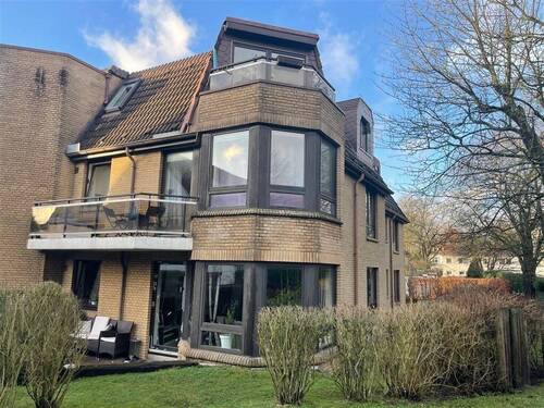 Gartenansicht - Charmante Erdgeschosswohnung mit großzügiger Terrasse - Nähe Zentrum Ahrensburg