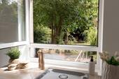 Küche mit Ausblick Garten - 5 Zimmer Reihenmittelhaus zum Kaufen in Lüneburg