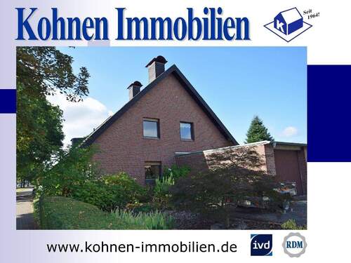 Gartenansicht - Ein Haus, viele Möglichkeiten: Großes Wohnhaus mit Einliegerwohnung und Bauland in 41379 Brüggen