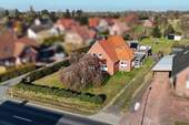Titelbild - Energetisch modernisiert! Haus auf großem Grundstück zentral in Warsingsfehn