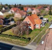 Energetisch modernisiert! Haus auf großem Grundstück zentral in Warsingsfehn - Moormerland