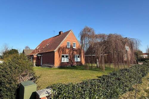 Straßenansicht - 5 Zimmer Einfamilienhaus in Moormerland