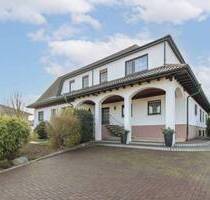 Gehoben und gepflegt: MFH mit 3 Wohneinheiten und Garten in familienfreundlicher Lage von Dornheim - Groß-Gerau