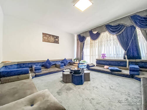 Wohnzimmer mit Ausgang auf die Loggia - 2 Zimmer Etagenwohnung in Lahr/Schwarzwald