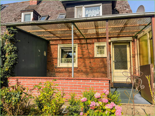 Überdachte Terrasse - Reihenendhaus mit 50,00 m² in Tönning zum Kaufen