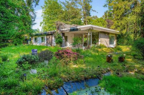 Ansicht - Verborgenes Paradies: Exklusiver Bungalow inmitten grüner Oase