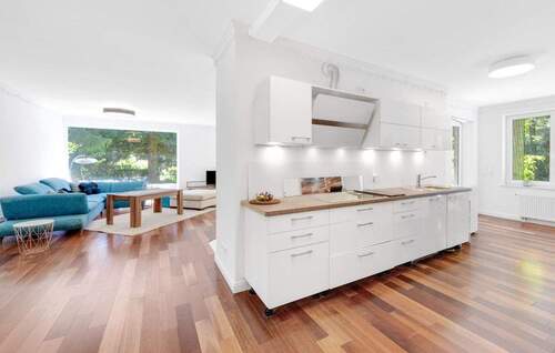 Wohnzimmer/Küche - 4 Zimmer Bungalow zum Kaufen in Buchholz in der Nordheide