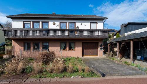 18368 Außenansicht - Freistehendes Einfamilienhaus mit Einliegerwohnung in Birresborn - mit Wintergarten & Garten