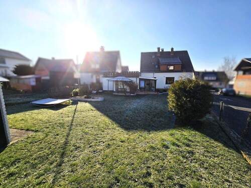 Rückansicht mit Garten - Mehrfamilienhaus, Wohnhaus mit 132,00 m&sup2; in Vellmar / Frommershausen zum Kaufen