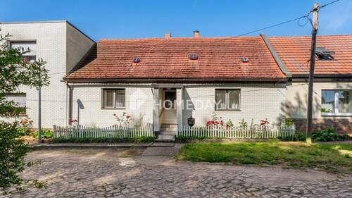 Außenansicht 1 - Sanierungsbedürftiges Reihenmittelhaus mit Nebengebäuden und Potenzial in ruhiger Lage von Beidersee