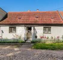 Sanierungsbedürftiges Reihenmittelhaus mit Nebengebäuden und Potenzial in ruhiger Lage von Beidersee - Petersberg