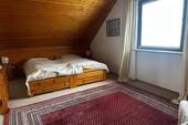 Schlafzimmer im Dachgeschoss - 