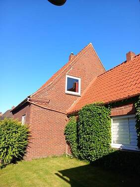 Rückansicht mit Anbau i.d. Morgensonne - Einfamilienhaus mit 85,00 m&sup2; in Wilster zum Kaufen