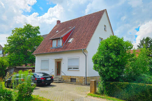 Titelbild - Zweifamilienhaus in OS-Hellern: Top Lage, top Entwicklungspotenzial!