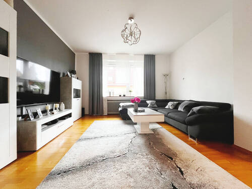 Wohnzimmer_EG_Front - Mehrfamilienhaus, Wohnhaus mit 134,00 m&sup2; in Osnabrück / Hellern zum Kaufen