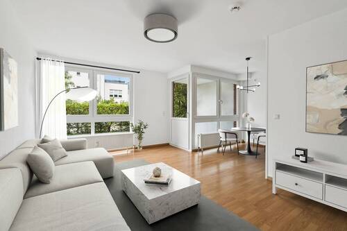 Digitales Staging Wohnzimmer - Ihr Rückzugsort im Grünen: Lichtdurchflutete 2-Zimmer Erdgeschosswohnung mit Garten