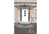Überdachter Eingangsbereich zum Gewerbeteil - 1 Zimmer Mehrfamilienhaus, Wohnhaus in Dettelbach