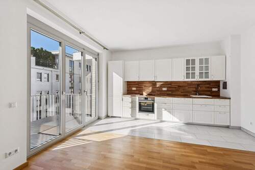 Wohnzimmer mit Wohnküche - 