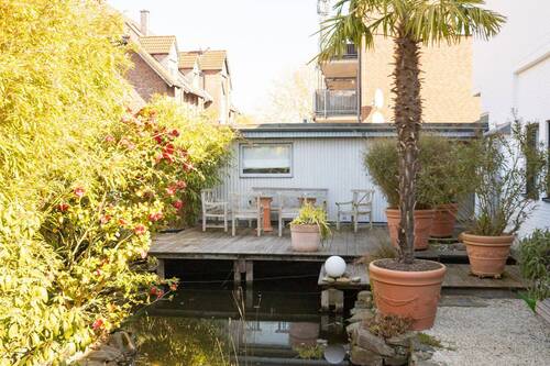 Terrasse/Teich - Einfamilienhaus mit 152,30 m&sup2; in Korschenbroich / Kleinenbroich zum Kaufen