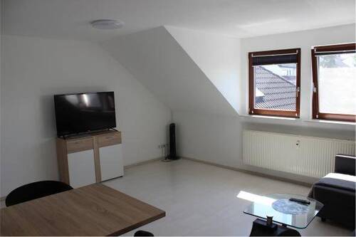 Wohnzimmer Bild 2 - Etagenwohnung mit 80,00 m² in Wiesbaden zum Kaufen