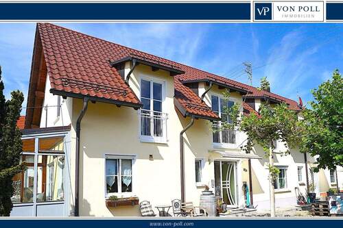 Ansicht Süd - Einfamilienhaus mit Wintergarten