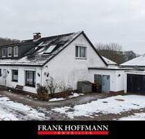 Sanierungsbedürftiges Zweifamilienhaus auf großzügigem Grundstück in Sievershütten