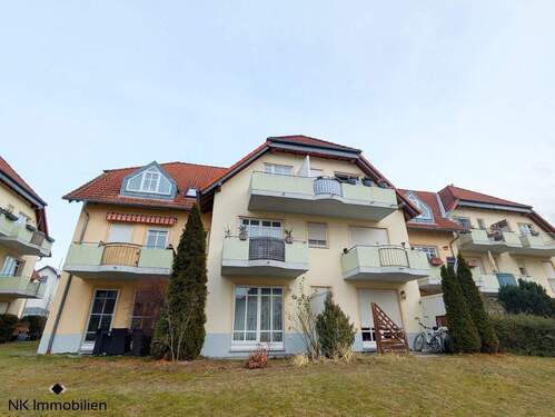 Gebäude (Rückansicht) - Etagenwohnung mit 53,40 m&sup2; in Weinböhla zum Kaufen