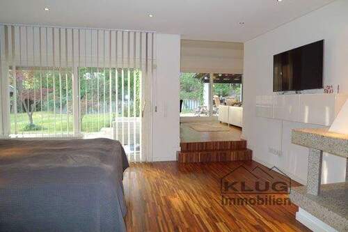 Parkettwohnzimmer mit Kamin im - Terrassenwohnung mit 275,00 m² in Berlin zum Kaufen