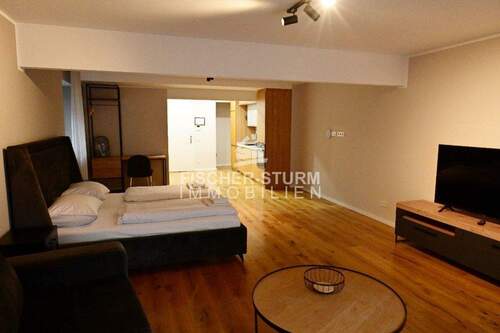 Zimmerblick zur offenen Küche - 1 Zimmer Etagenwohnung zum Kaufen in Düsseldorf