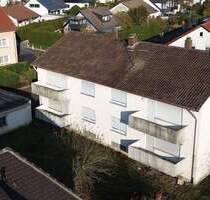 Bebautes Grundstück mit genehmigter Planung für MFH mit 8 Wohneinheiten und Tiefgarage in Herzogenaurach-Ost