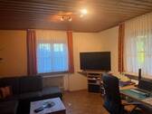 Wohnzimmer mit Kachelofen - 