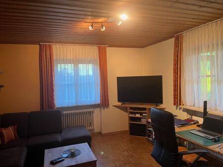 Wohnzimmer mit Kachelofen - 