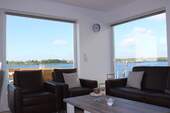 Wohnzimmer mit Wasserblick - 