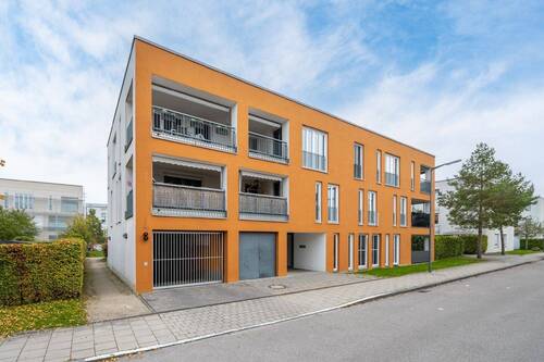Aussenansicht - AIGNER - Familienfreundliche 4-Zimmer-Wohnung in modernem Wohnquartier in Fröttmaning