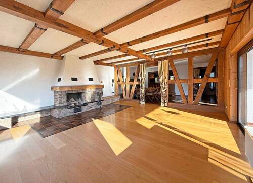 Wohnbereich mit offenem Kamin (EG) - 1 Zimmer Einfamilienhaus zum Kaufen in Allendorf (Lumda)