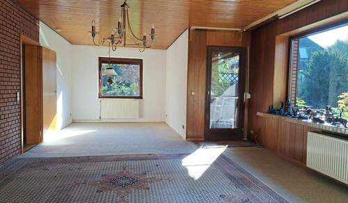 Wohn- und Esszimmer mit Terrassenzugang - 