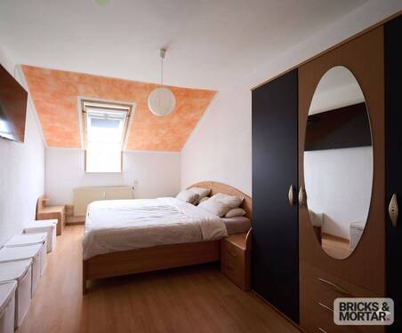 Schlafzimmer Dachgeschoss-Wohnung - 