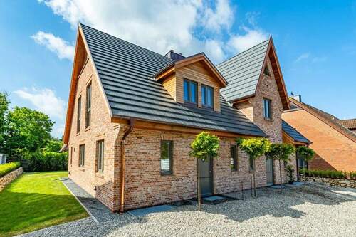 Bild 1 - Neubau-Doppelhaushälfte in ruhiger strandnaher Lage (FW)