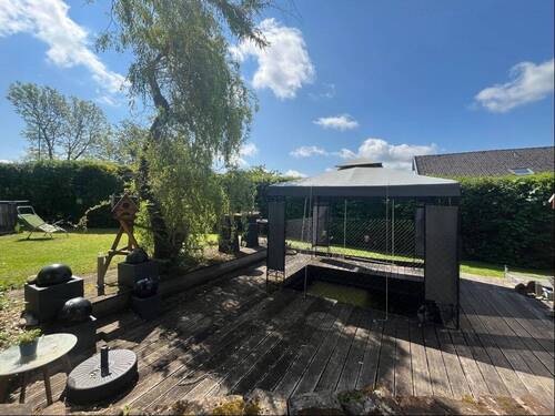 Terrasse mit Fischteich - 