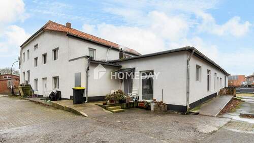 Außenansicht 1 - 2 Zimmer Mehrfamilienhaus, Wohnhaus in Großenkneten