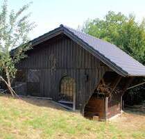 Seltene Ortslage von Ruppichteroth: Baugrundstück mit Scheune