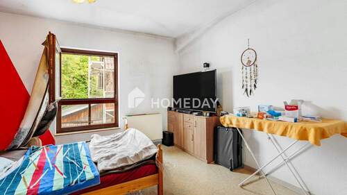 1. OG Schlafzimmer 1 - 