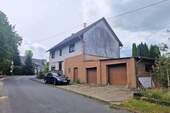 Seitenansicht - 6 Zimmer Mehrfamilienhaus, Wohnhaus zum Kaufen in Windeck