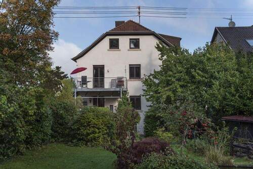 Rückansicht - 9 Zimmer Mehrfamilienhaus, Wohnhaus zum Kaufen in Riegelsberg